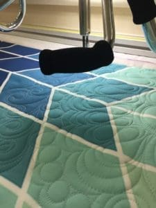 A close up of the floor with a roller on it
