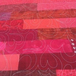 A close up of the fabric for a quilt