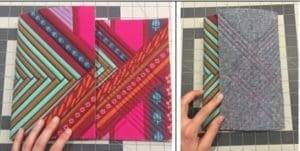A person holding up two different types of fabric.