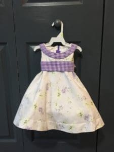 A dress hanging on the wall