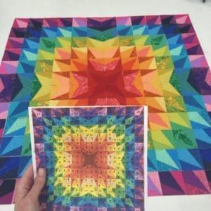 A person holding up two different colored paper