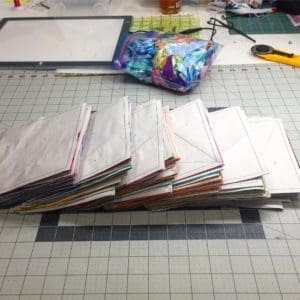 A table with many different bags of paper