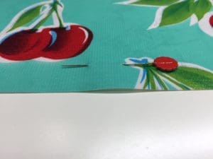 A close up of the cherries on a table