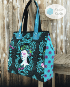 A woman holding onto a bag with a picture of a lady on it