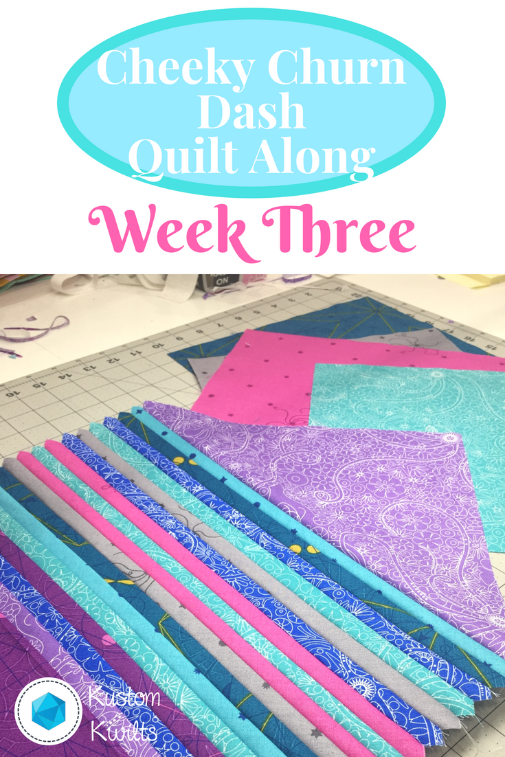 A close up of a quilt with the words " a little quilt along week three ".