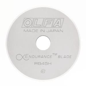 A white blade with the words " olfa " written on it.