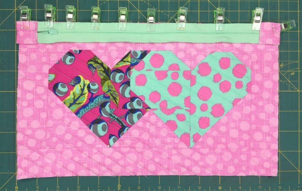 Two hearts are shown in a row.