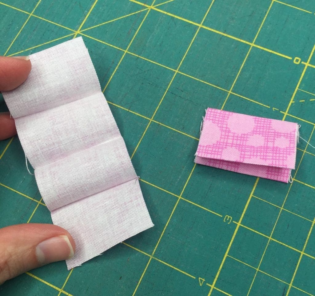 Two hearts are shown in a row on the same color.