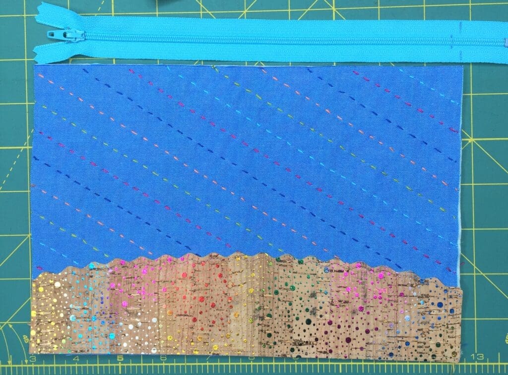A blue bag with some sequins on it