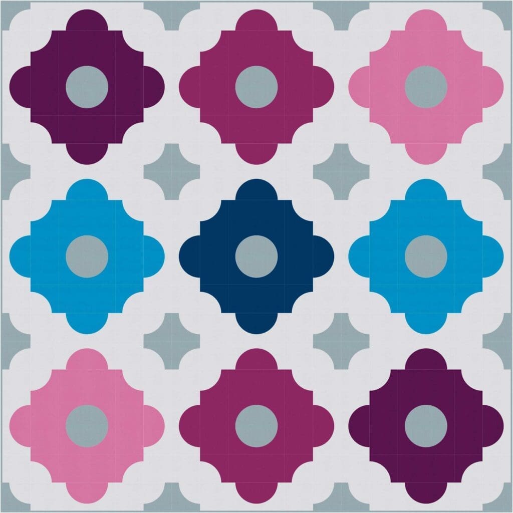 A square image of a quilt with nine different colors.