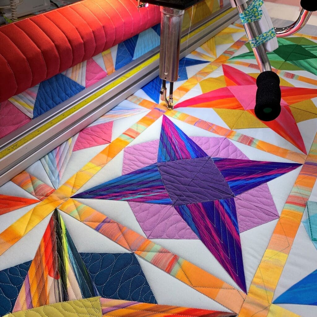 A person is cutting paper with a large machine.