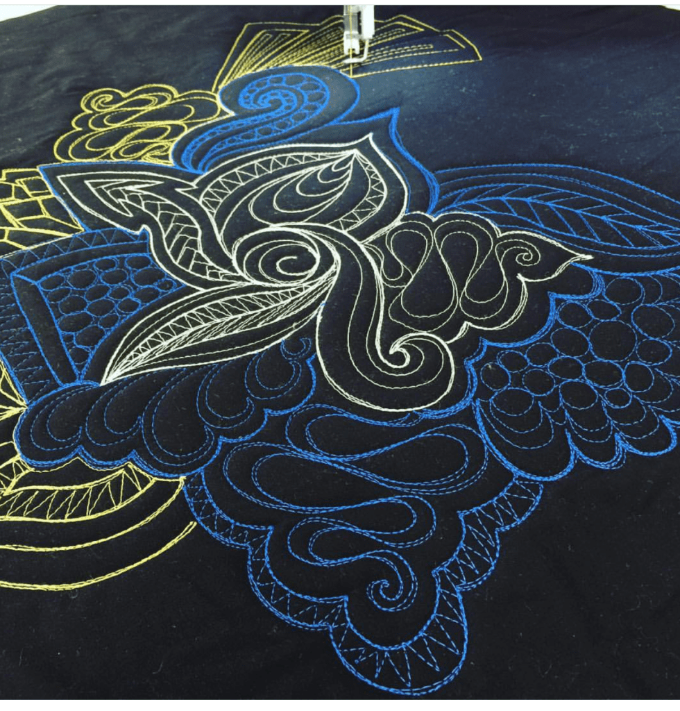 A close up of a black and blue design