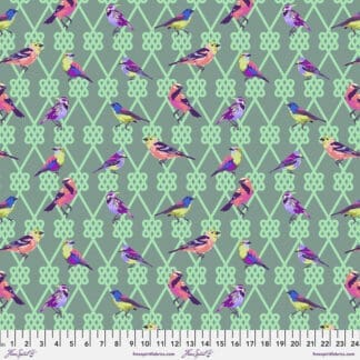 A pattern of birds sitting on top of green and purple argyle.