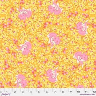 A yellow and pink floral pattern on fabric.