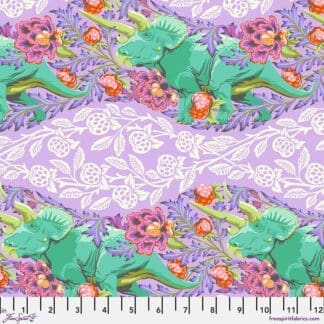 A purple and green floral pattern with white background.