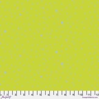 Solid lime green fabric with a subtle texture and a ruler for scale.